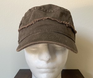 brown cabbie hat