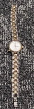 TIMEX Indiglo CR 1216 Cell Womens Watch Water Resistant Run Two tone gold silver