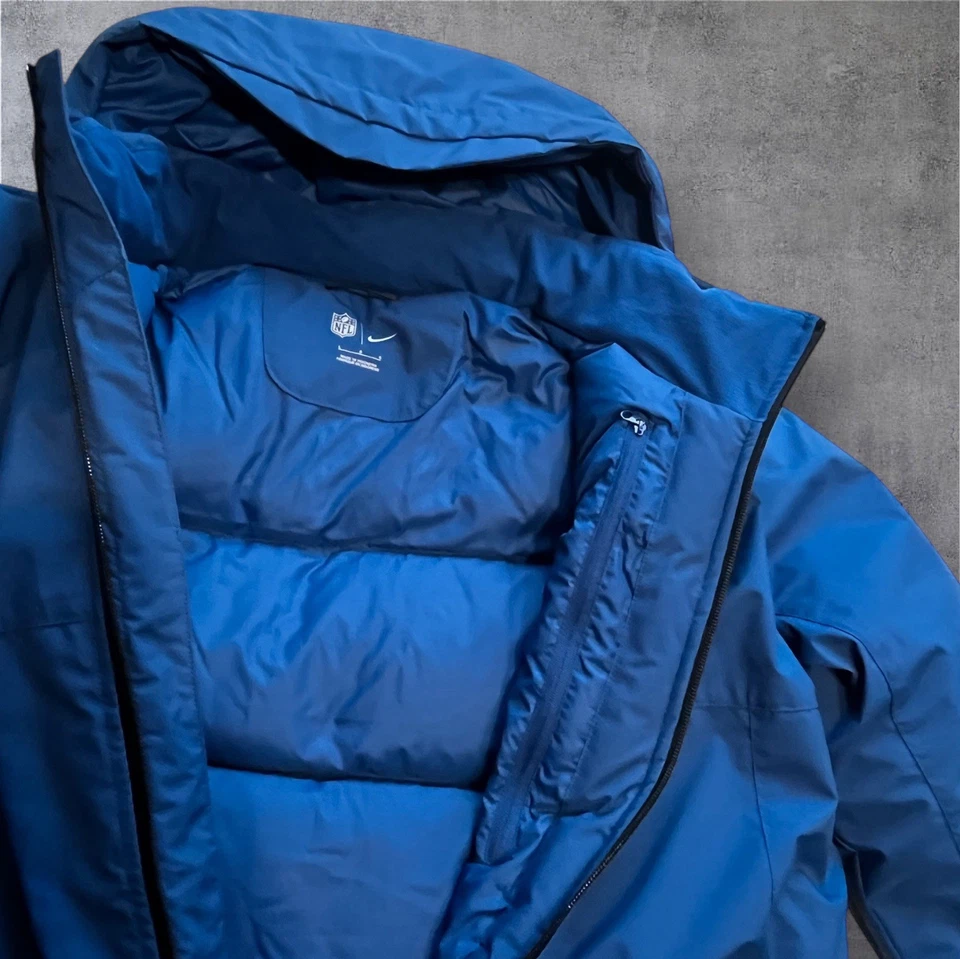 Chaqueta Nike NFL Shield Duck Down con capucha lateral azul real para hombre talla L nueva Foto 3 de 4