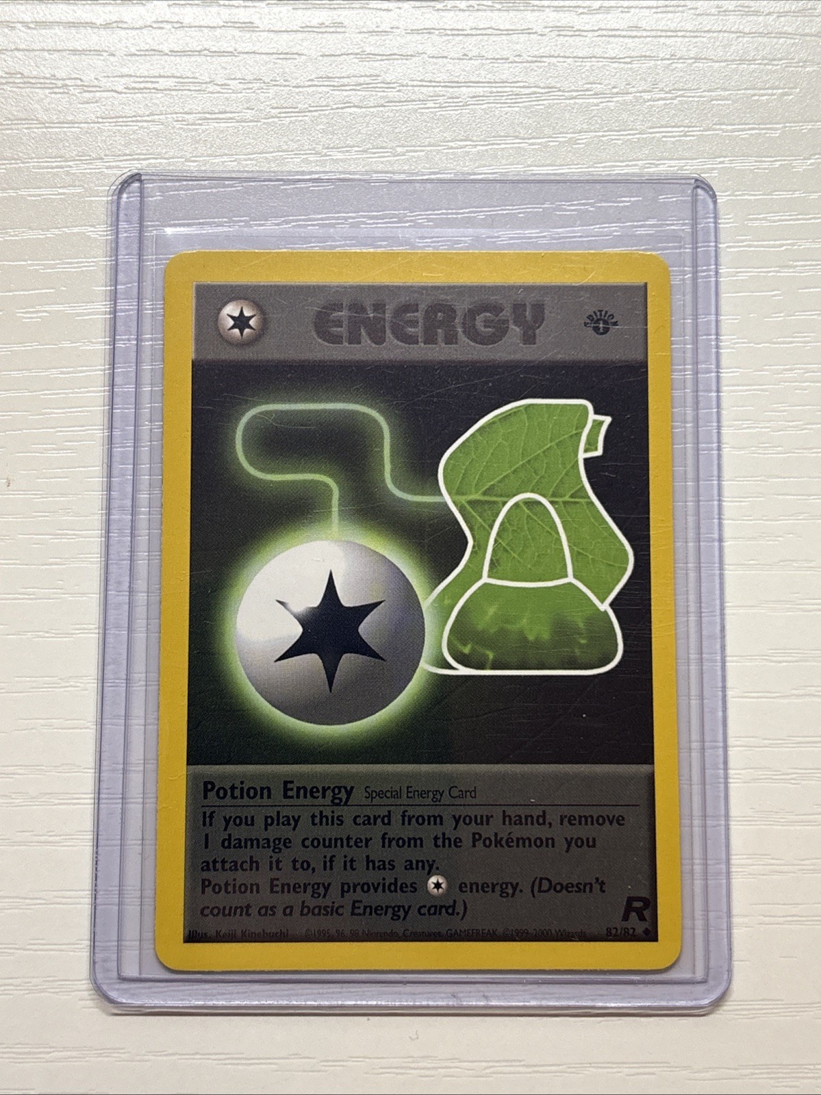 Potion Energy 82/82 1st Edition Team Rocket (NM)