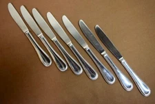 Set of 7 Gorham Braid stainless dinner knives, 9-1/4"