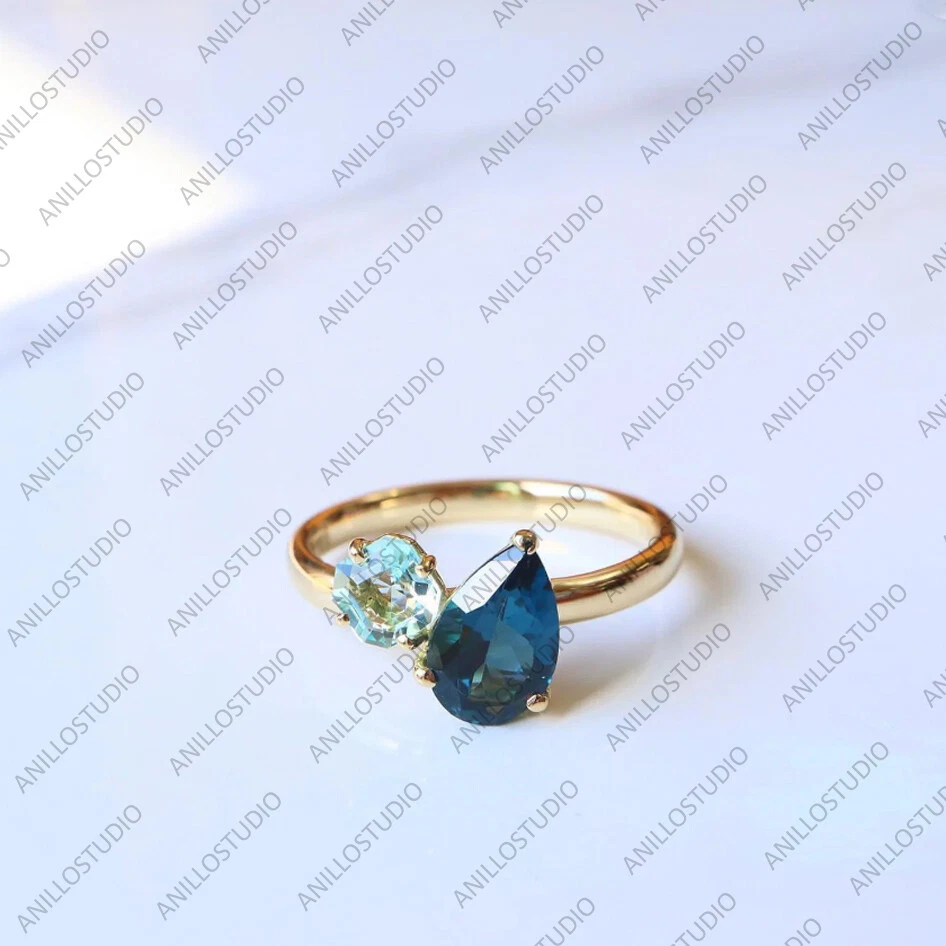 Anillo de plata de ley 925 con banda Toi Et Moi y zafiro azul pera de 7x4 mm Foto 4 de 4