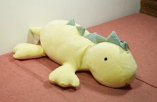 Pillowfort Dinosaur Weighted Plush Kids' Throw Pillow Yellow (Dirt Marks)