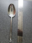 Brocade by International Sterling Silver Serving Spoon 8 3/8", gently used