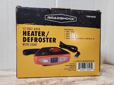 12 VOLT AUTO HEATER/DEFROSTER WITH LIGHT RED In BOX