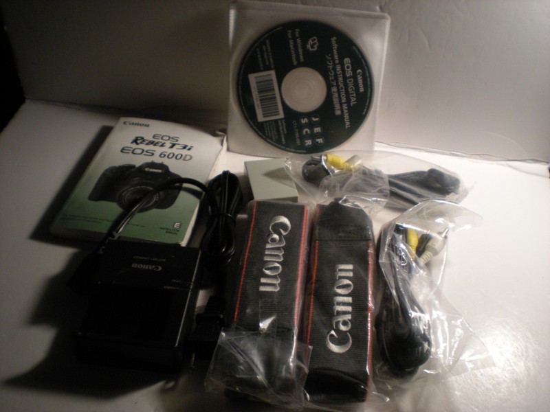 Lot - Accessories For Canon EOS T3i Charger, Battery, Cables And Others