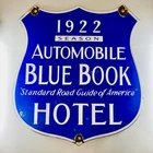 1922 Season Automobile Blue Book Hotel Porcelain Enamel Vintage Sign 10" x 9"