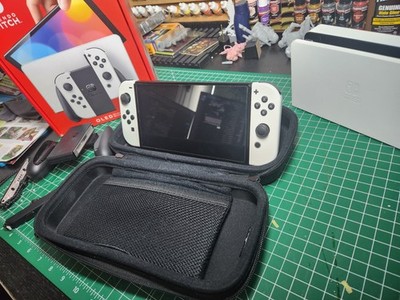 Nintendo Switch OLED + Monster Hunter Rise