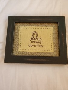 Dad Means Devotion Embroidered Sign Rustic Black Frame Olive Green Background