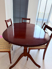 Oval Dark Wood Dining Table with  6 Striped Upholstered Chairs