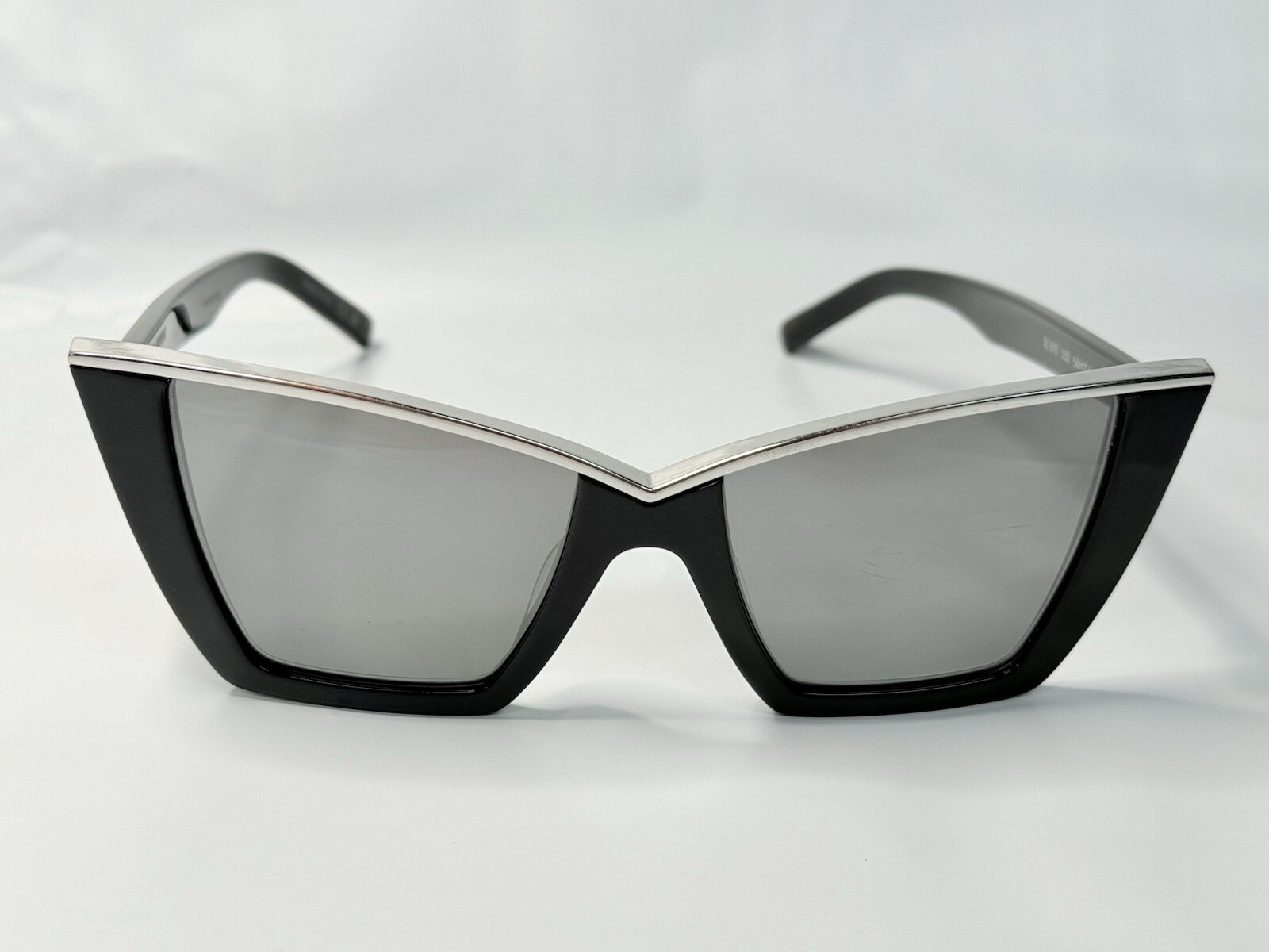 Occhiali da sole donna Saint Laurent SL 570 002 nero metallo argento specchiati occhio di gatto