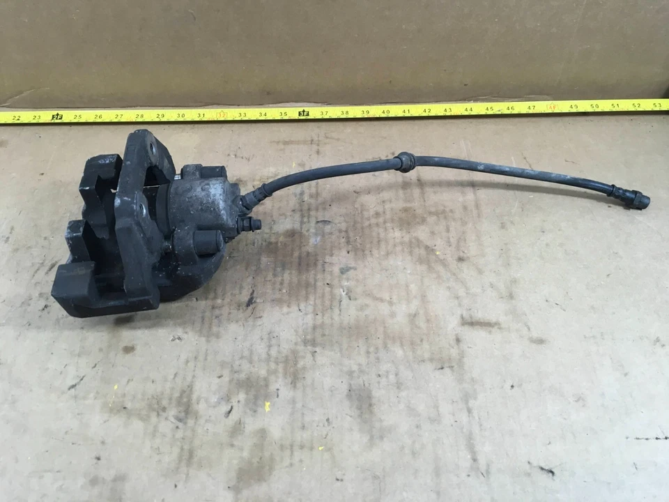 Pinza de freno trasera derecha o izquierda BMW X5 2012 6776787/6776788 OEM. Foto 3 de 4