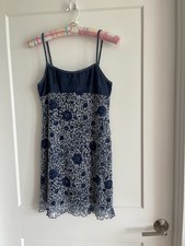 Lace strip blue flower dress, top is jeans material.