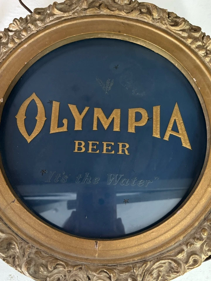 Letrero eléctrico vintage de estrellas centelleantes animadas de cerveza Olympia Foto 4 de 4