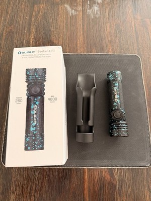 Olight Seeker 4 Pro Flashlight 4600 Lumens with Holster