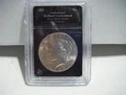 1- 1923 PEACE SILVER DOLLAR IN UNCIRCULATED SLABBED