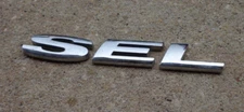 Ford Taurus SEL emblem letters badge decal logo trunk OEM Genuine Original Stock