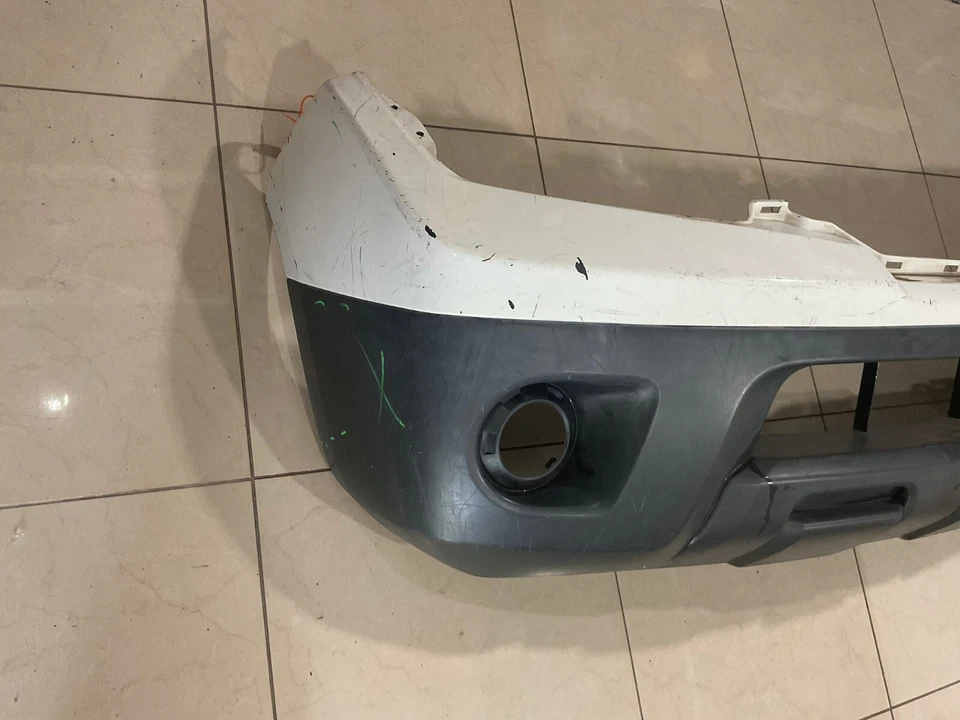 Cubierta de parachoques superior delantera blanca Nissan Frontier 62022+ZL00B 2009-2021 OEM Foto 4 de 4