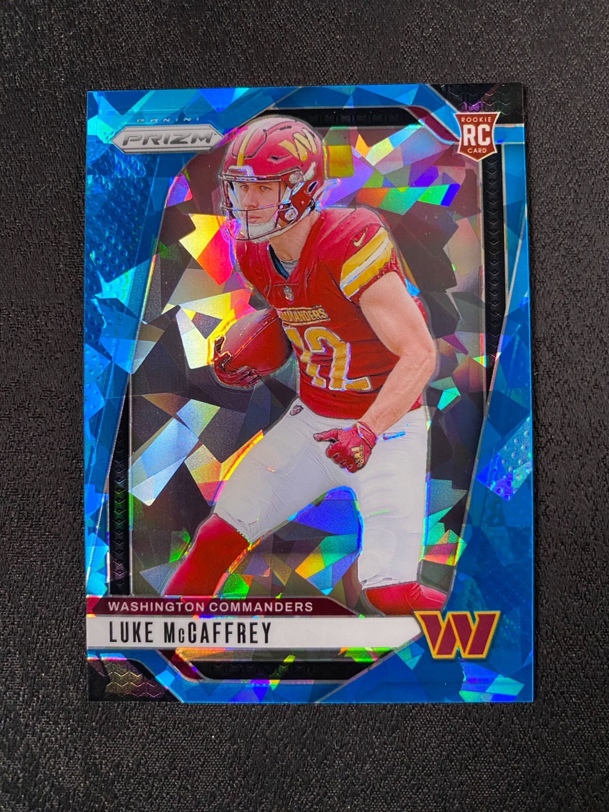 2024 Panini Prizm Luke McCaffrey Blue Ice Rookie RC 77/99 Commanders #367 B172