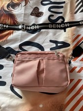 BRAND NEW NEVER BEEN WORN Bench bag. Strap can be worn Black Side Or Silver Side