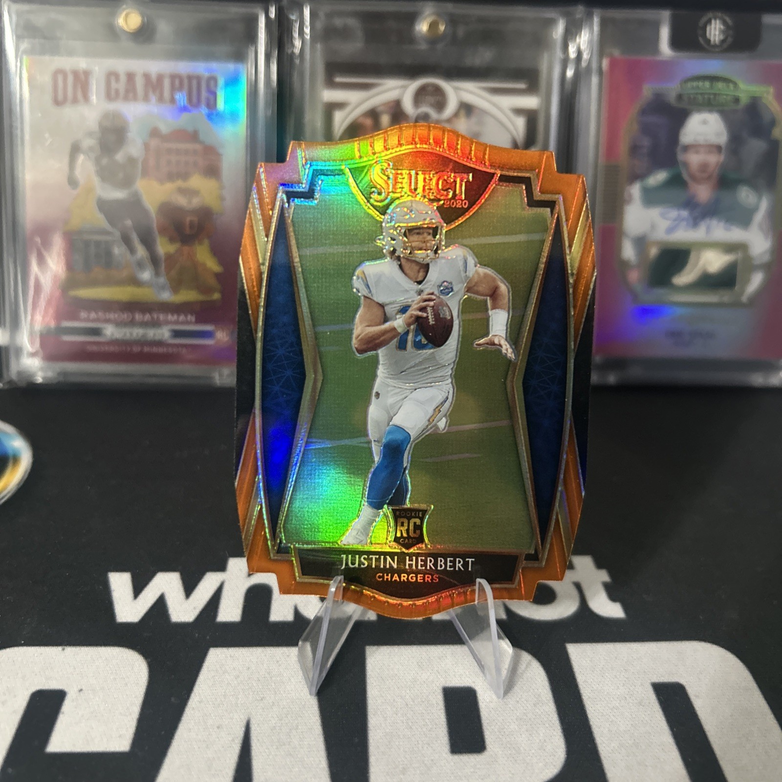 Justin Herbert 2020 Panini Select Premier Level Orange Prizm Die-Cut #144 (RC)