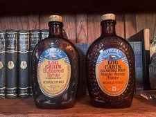 VINTAGE LOG CABIN SYRUP~1776~BROWN GLASS~BICENTENNIAL FLASKS maple / Butter (2)