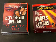 Two Audiobooks Angels and Demons (used) Because You Love Me (new)