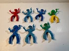 Lot of  7 vintage Lido Plastic Swivel Hip Cowboys and Indians.