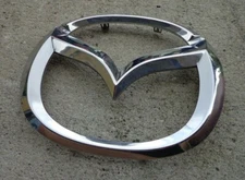 Mazda CX-7 grill emblem badge decal logo grille front OEM Factory Genuine Stock