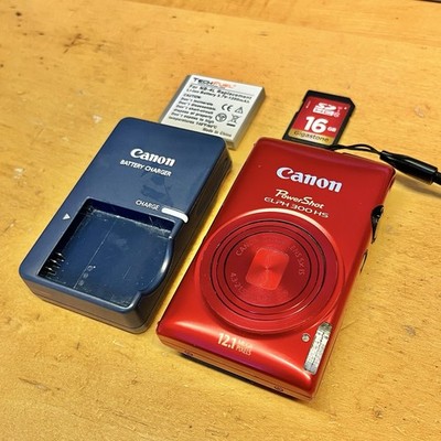 Canon PowerShot ELPH 300 HS 12.1 MP Red PC1591 Tested Works W/ Charger & SD Card