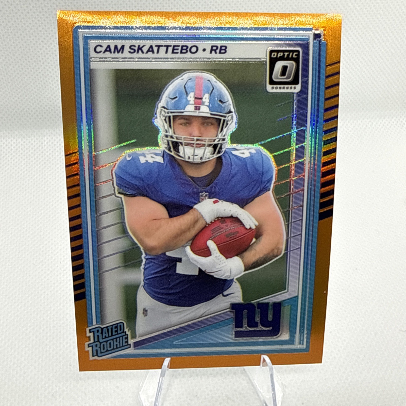 Cam Skattebo 2025 Panini Donruss Optic #228 Orange Prizm Rated Rookie /299 RC