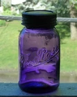 Antique quart size THE ROSE deep purple fruit canning jar
