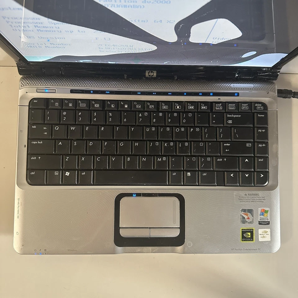"Laptop 14,1"" HP dv2171cl AMD Turion 64 X2 1 GB de RAM sin disco duro" Foto 3 de 4