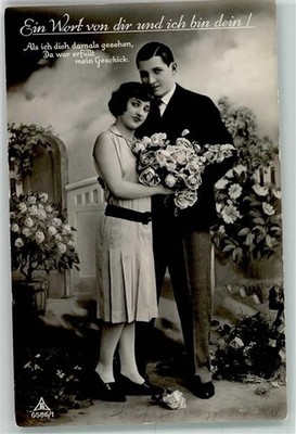 39681343 - A word from you and I am yours! young man gifts his wife