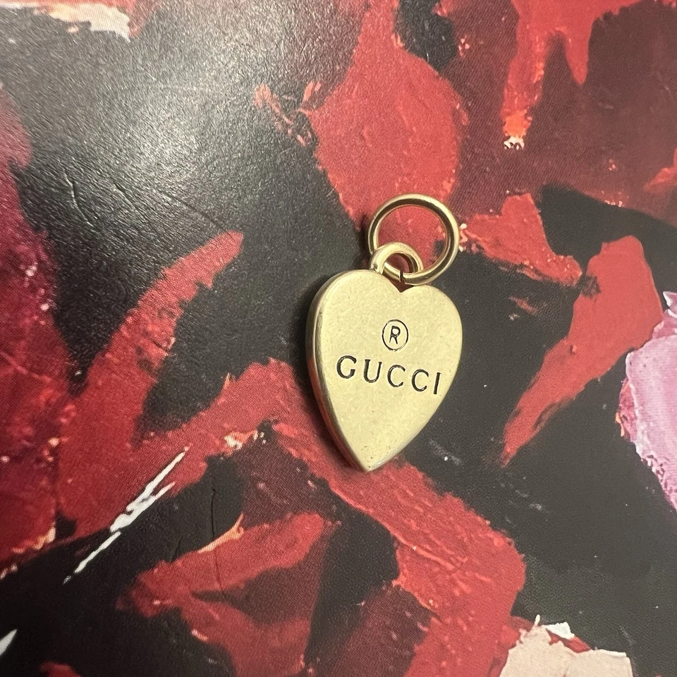 Tirador de cremallera corazón GG tono dorado usado excelente estado Foto 2 de 3