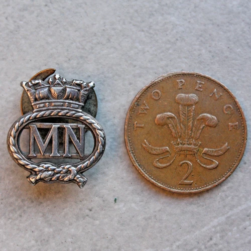 An original WW2 silver Merchant Navy official issue 'MN' war service lapel badge