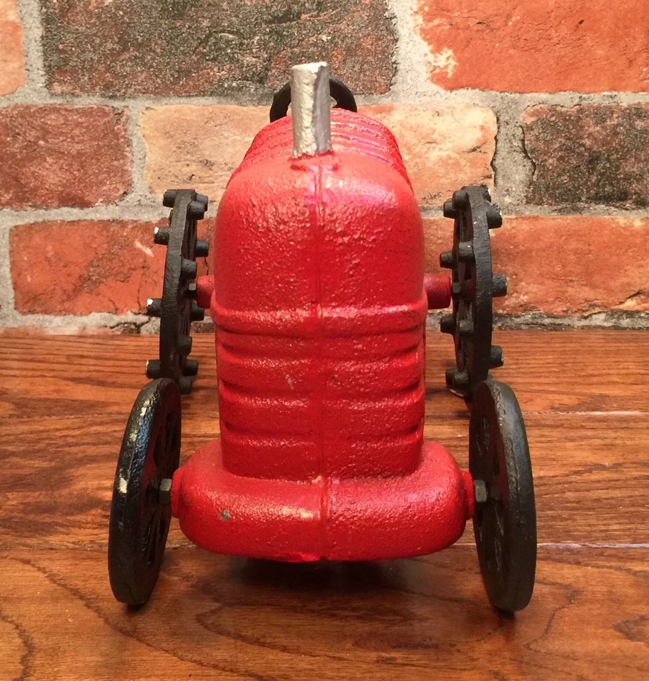 Juguete tractor agrícola rojo vintage de hierro fundido John Deere Foto 3 de 4