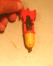 Vintage Cap Bomb Spaceman in Orange and Yellow  Spaceship