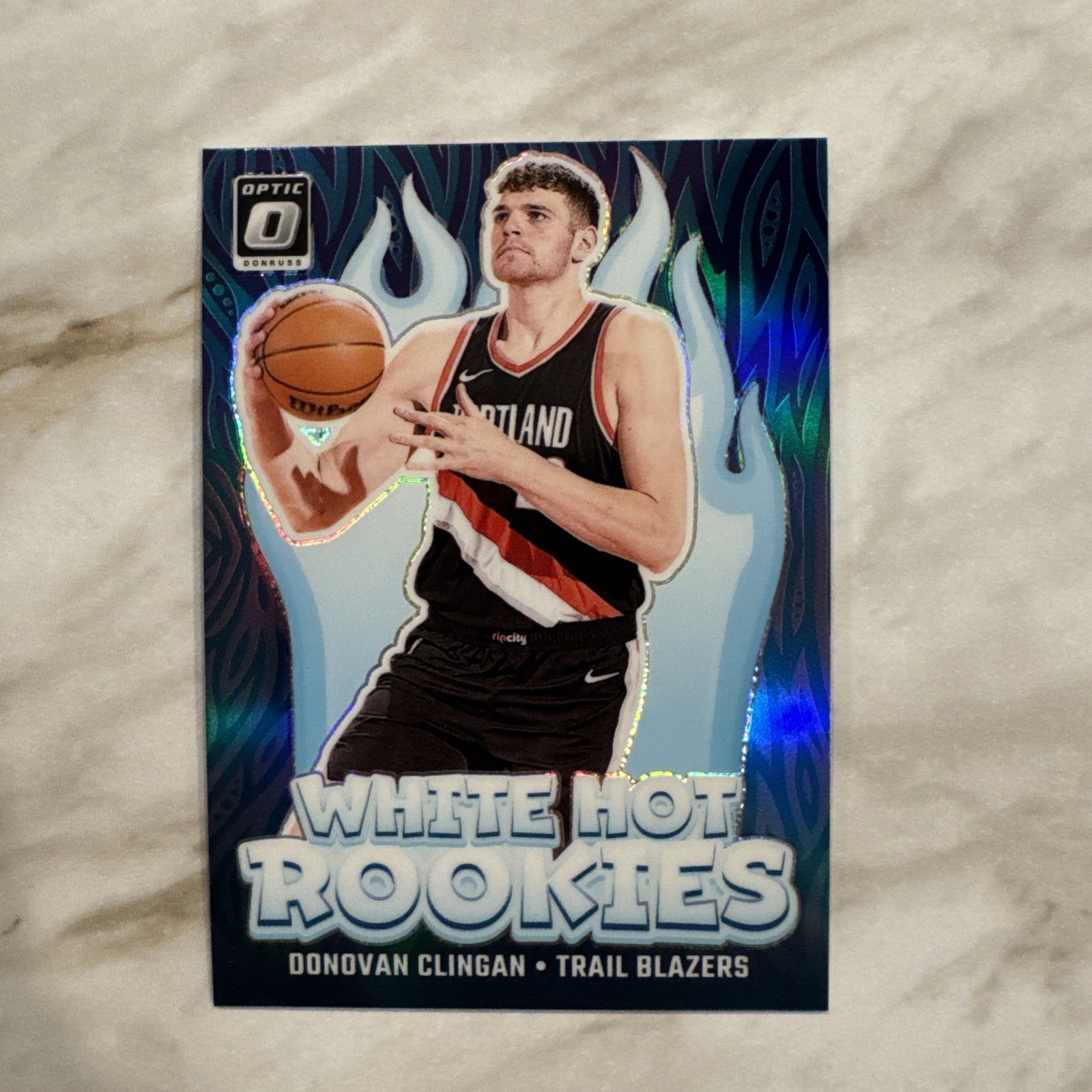 DONOVAN CLINGAN 2024-25 DONRUSS OPTIC WHITE HOT ROOKIES PURPLE RC