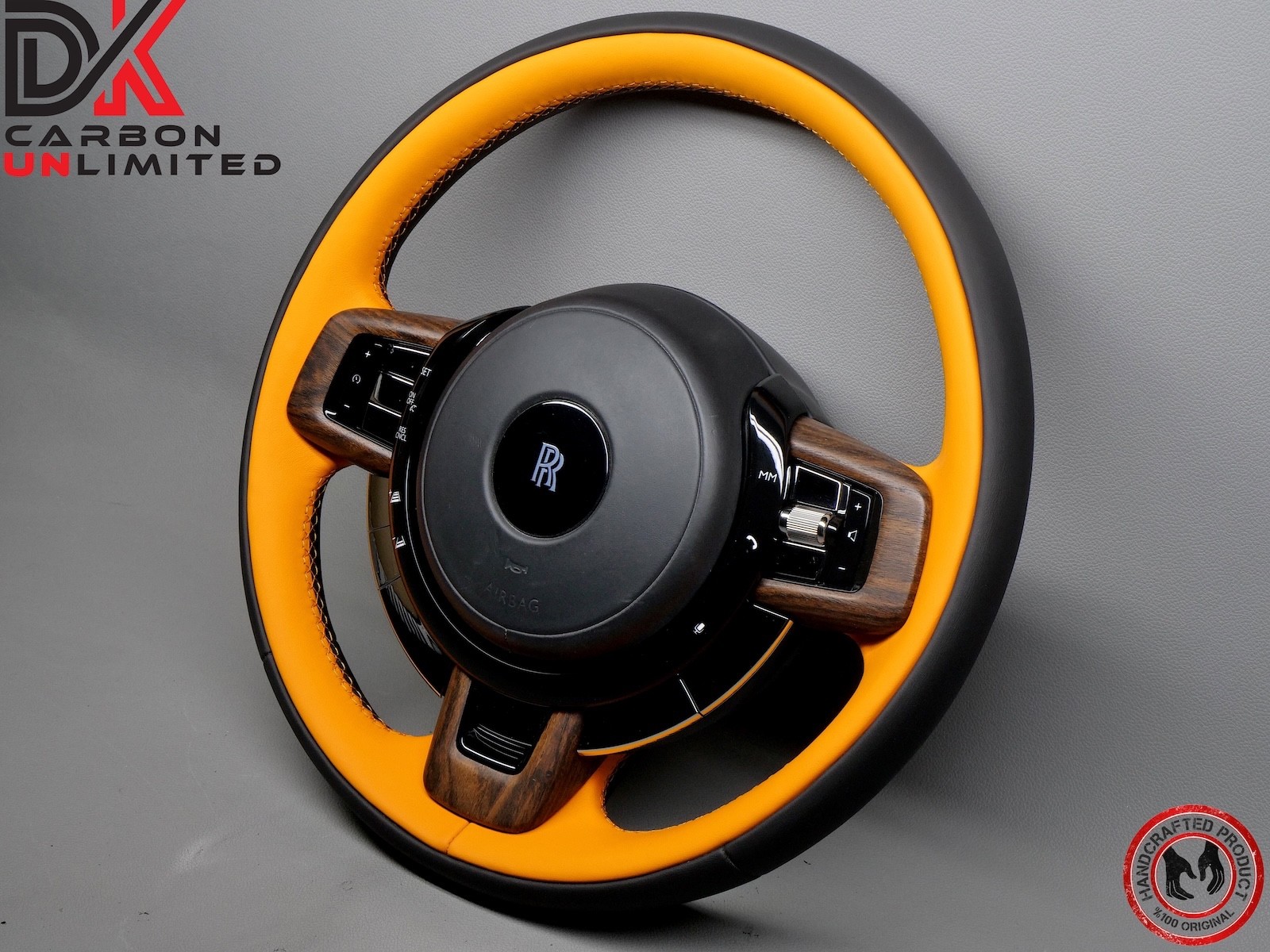 Rolls Royce Spectre Thick Rimmed Two Tone Black & Mandarin Stitch Steering Wheel