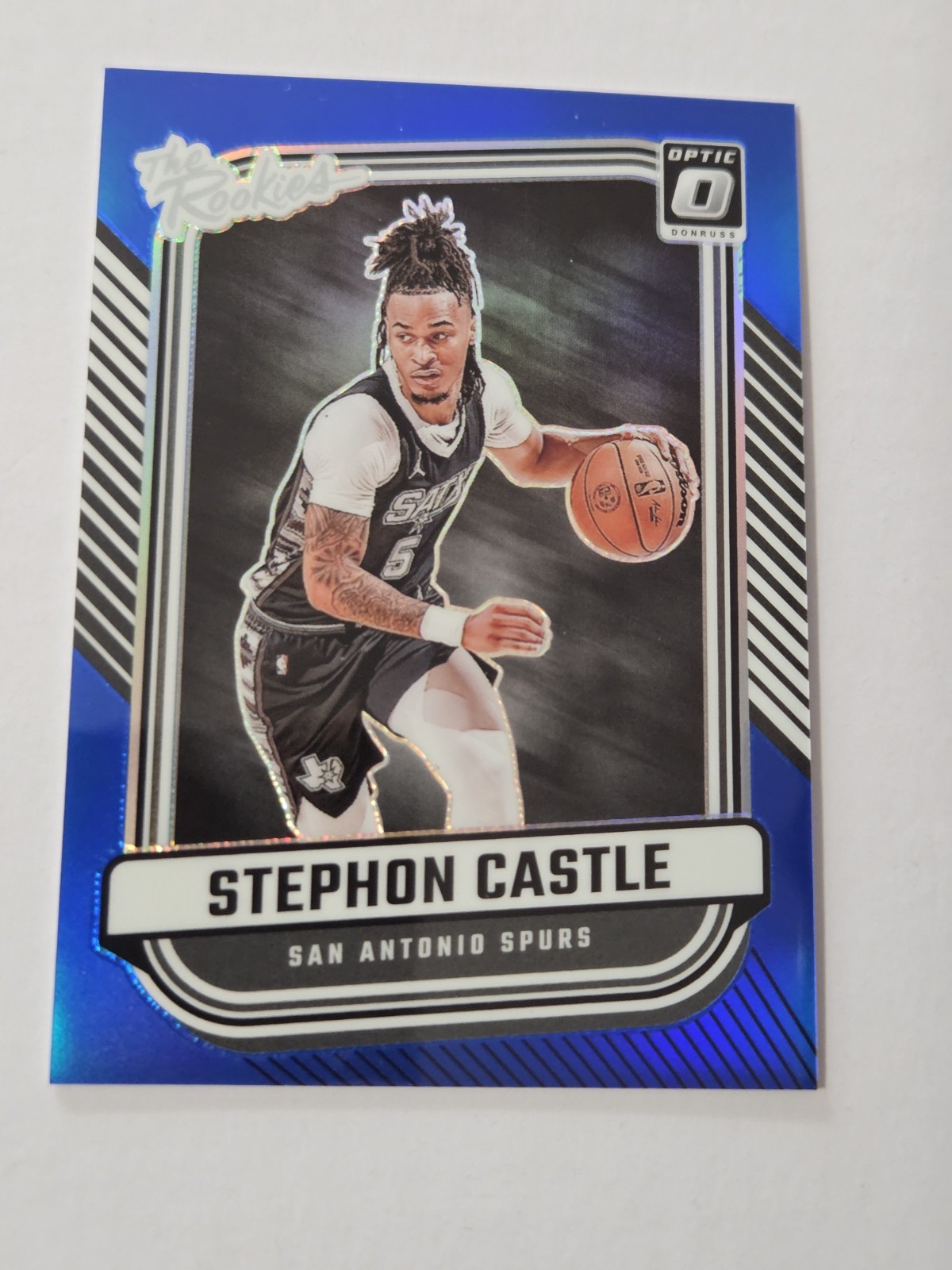 2024-25 Donruss Optic Basketball The Rookies #4 Stephon Castle Blue /49 Spurs
