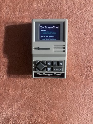 Basic Fun! The Oregon Trail Electronic Handheld Game Working And Sound Tested