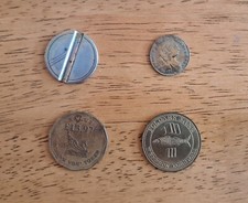 Readers Digest, Poldark Mine, Slotted Security Tokens and a Coin