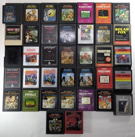 Lot of 37 Atari Games 35 2600 1 7800 1 Unknown + 8 vintage Musicmate Organizers