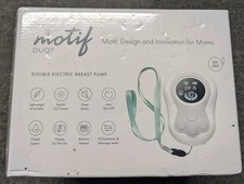 Brand new Breast pump, motif duo, comes with the storage bags and pump bra.
