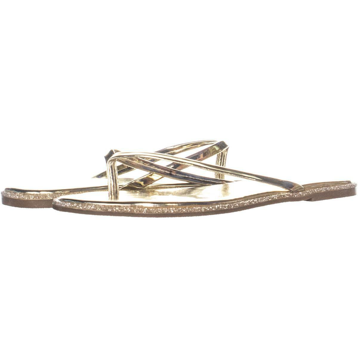 bebe gold flip flops