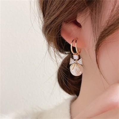 Magnifiques boucles d'oreilles en perles design poisson complément idéal à un