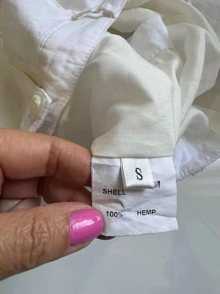 Pantalones cortos informales de cáñamo de tiro medio con frente plano blancos pequeños Foto 4 de 4