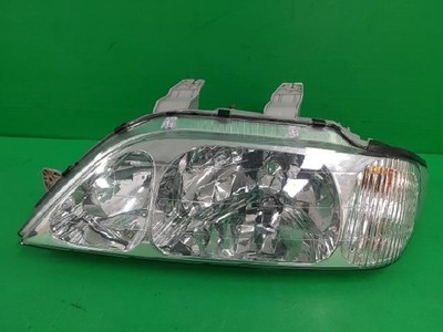 2003 KG Mobility (SsangYong) Musso Headlight Assembly Left Side OEM 8310105133