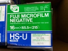 1-box of (61 ROLLS) of FUJI HS-U 16mm x 215' MICROFILM EXP-5/99